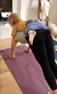 yoga kid - on back of yogi